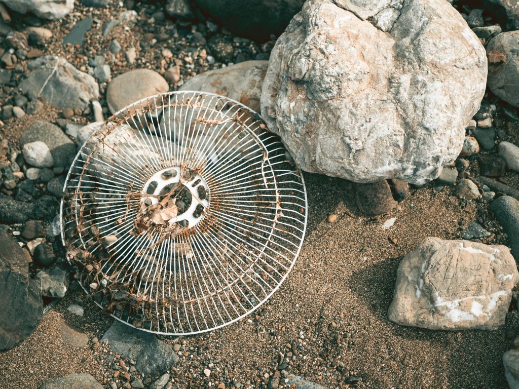 Old fan face by the river
