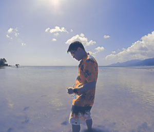 Sean Si - walking in beach water